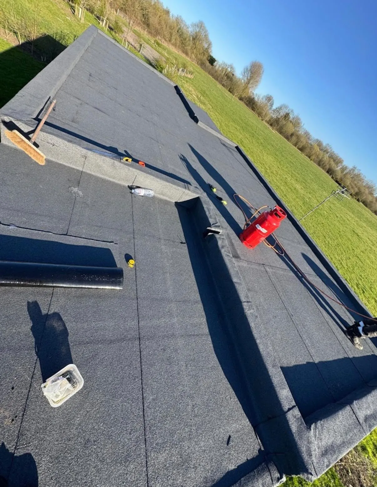 Torch-on felt flat roof replacement in progress near Leicester