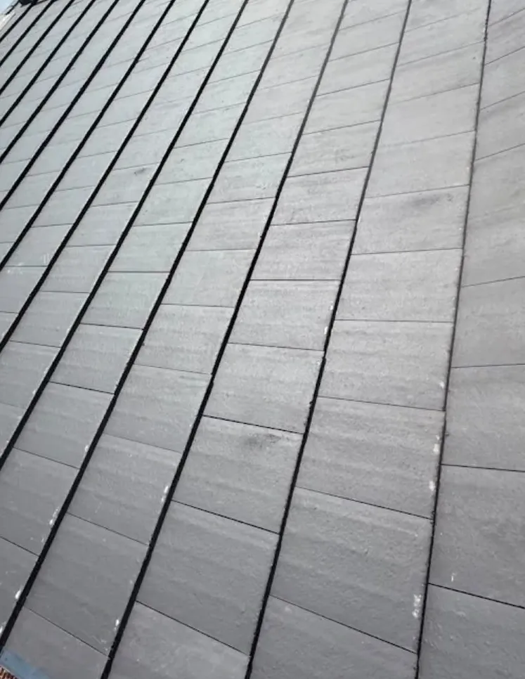 Close-up of roof tiles checked during a roof inspection in Leicester