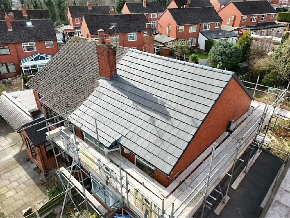 Aerial view of a completed grey tile re-roof on a Leicester bungalow