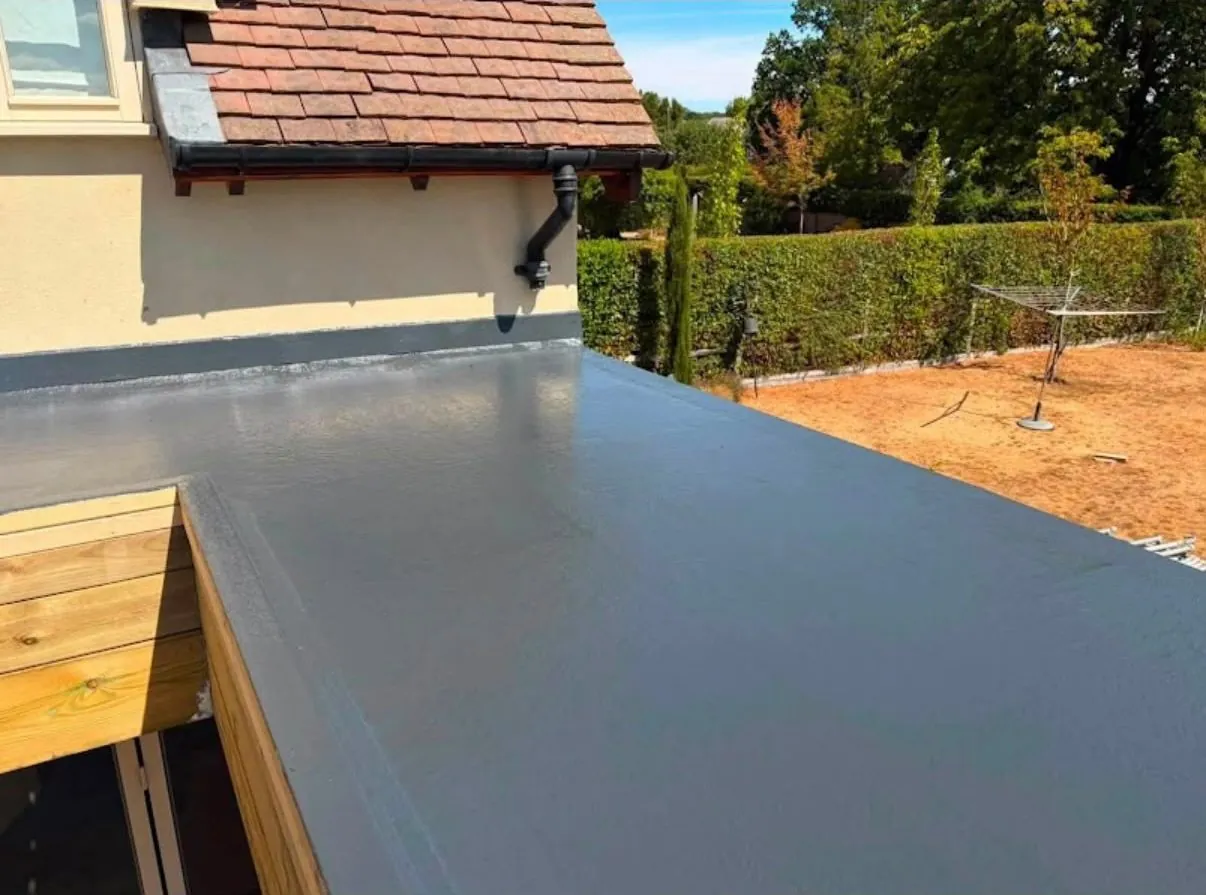 Grey fibreglass GRP flat roof on a Leicester garden extension